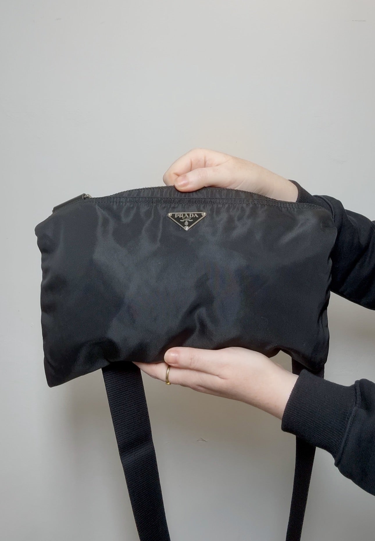 Black Prada Tessuto nylon crossbody bag with logo plaque and adjustable strap